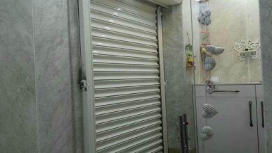 حفاظ کرکره ای برقی پشت درب آپارتمان 47