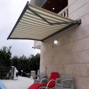 سایبان برقی کرمان نصب روی دیوار با رول بولت مقاوم