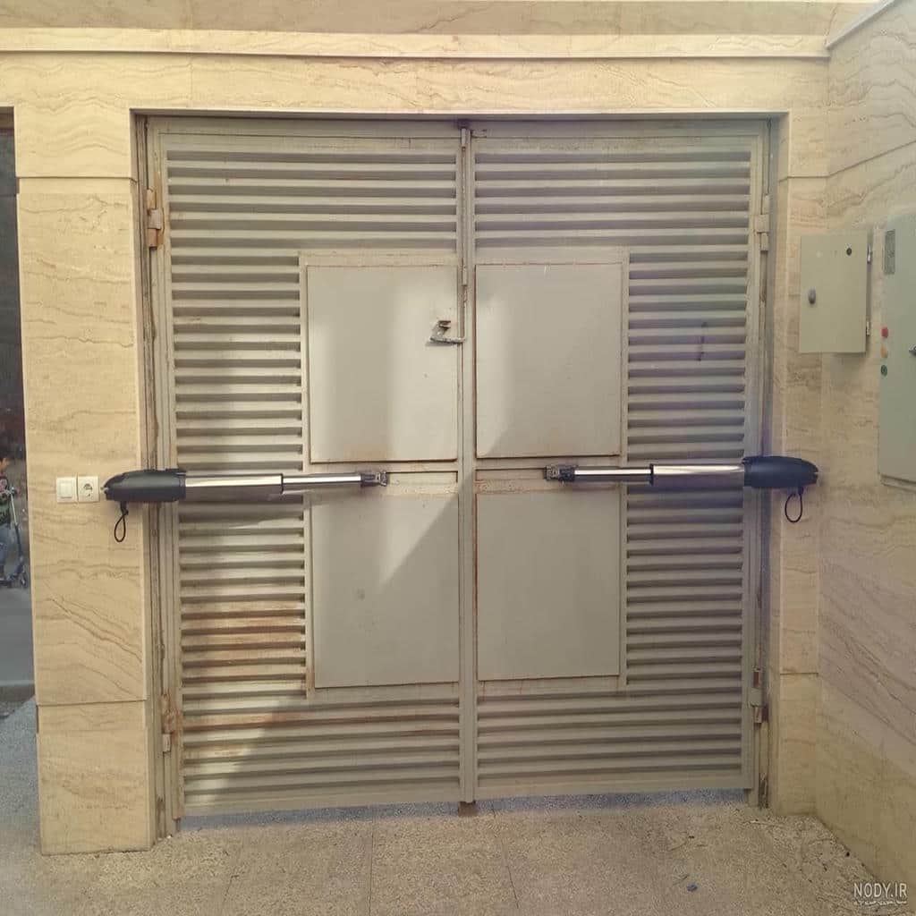 نصب جک درب پارکینگ در کرمان با سیم کشی ایمن و کابل کشی اصولی