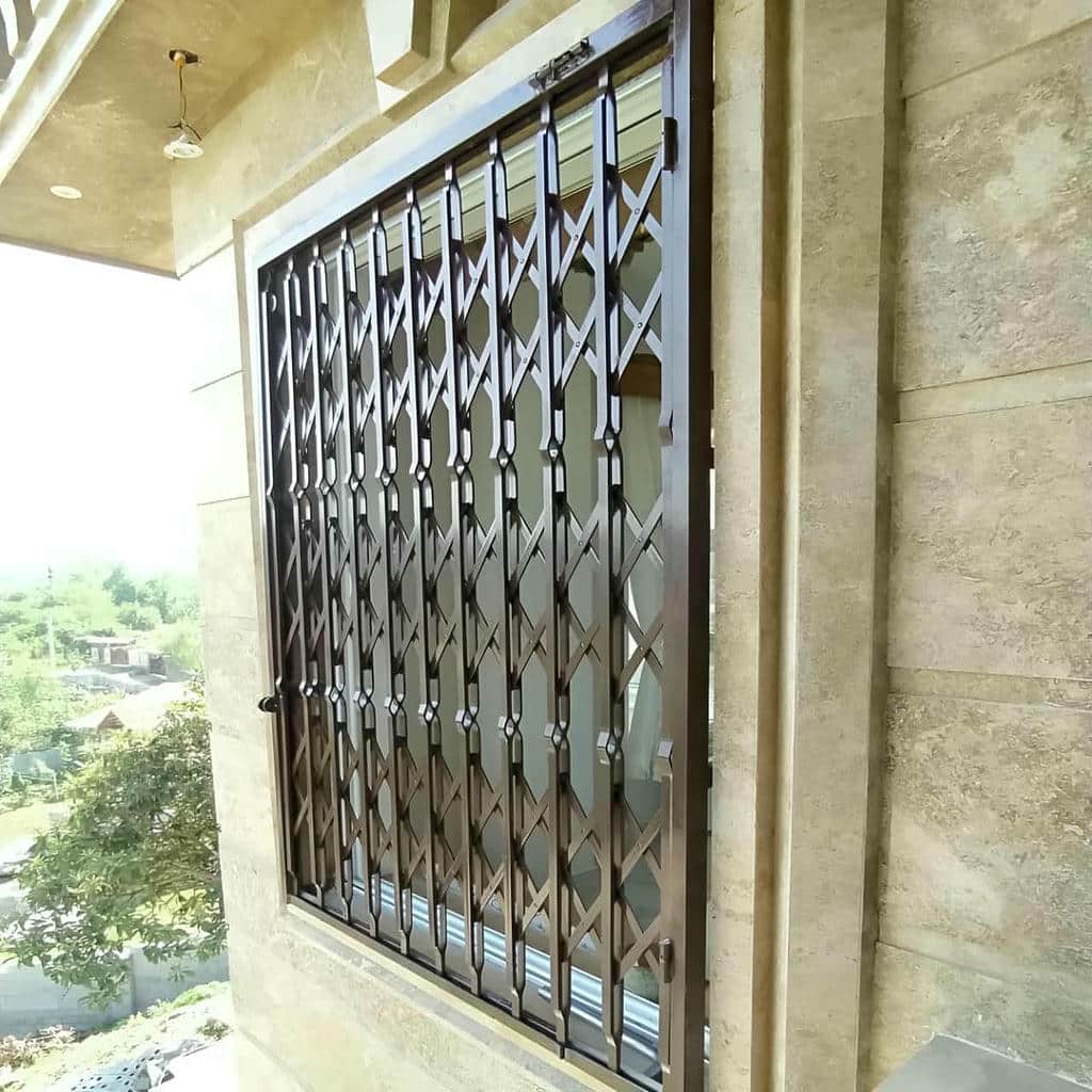 فروش درب ریلی آکاردئونی کم جا با تسمه فولادی در کرمان