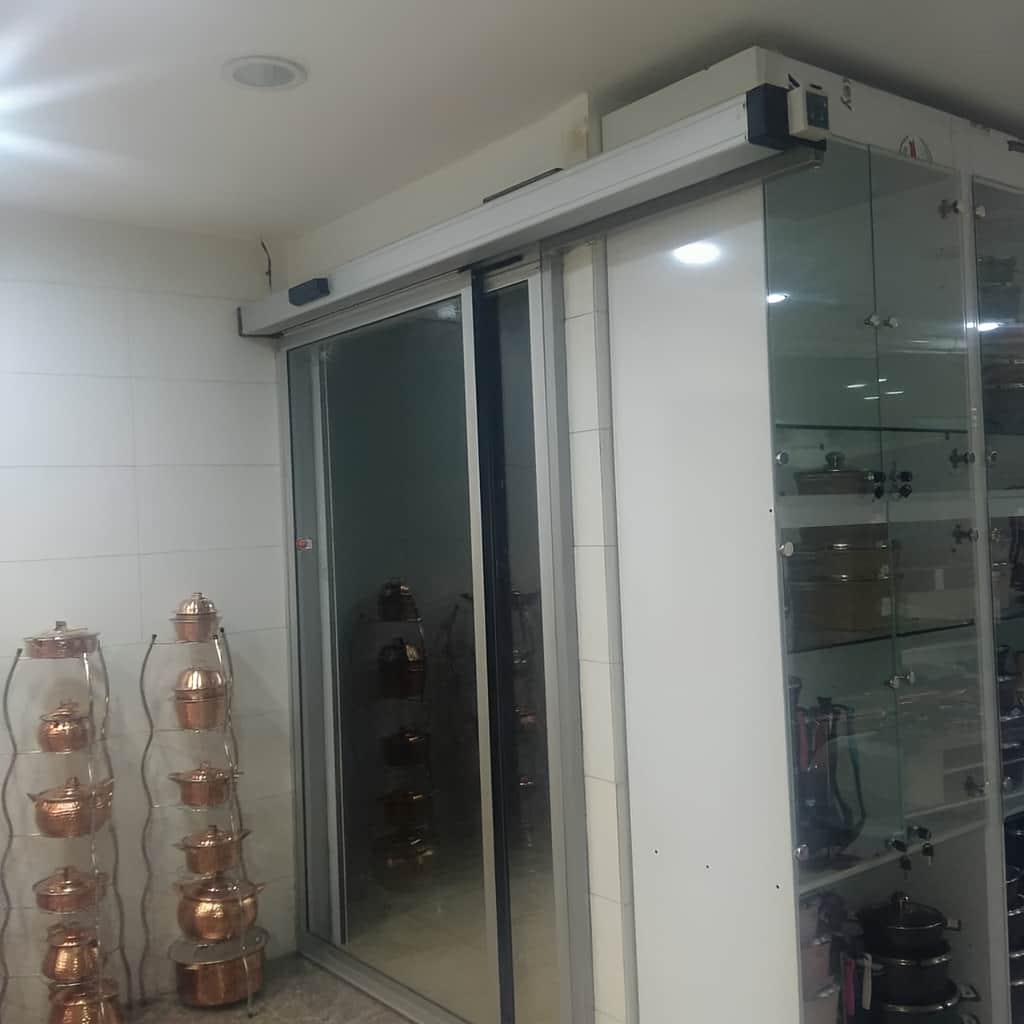 اجرای درب اتوماتیک شیشه ای تلسکوپی مجتمع در کرمان
