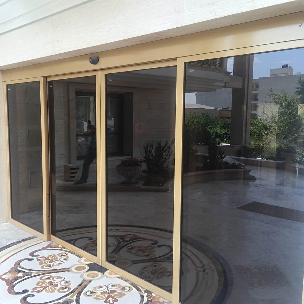 اجرای ریل تلسکوپی درب اتوماتیک شیشه ای در کرمان