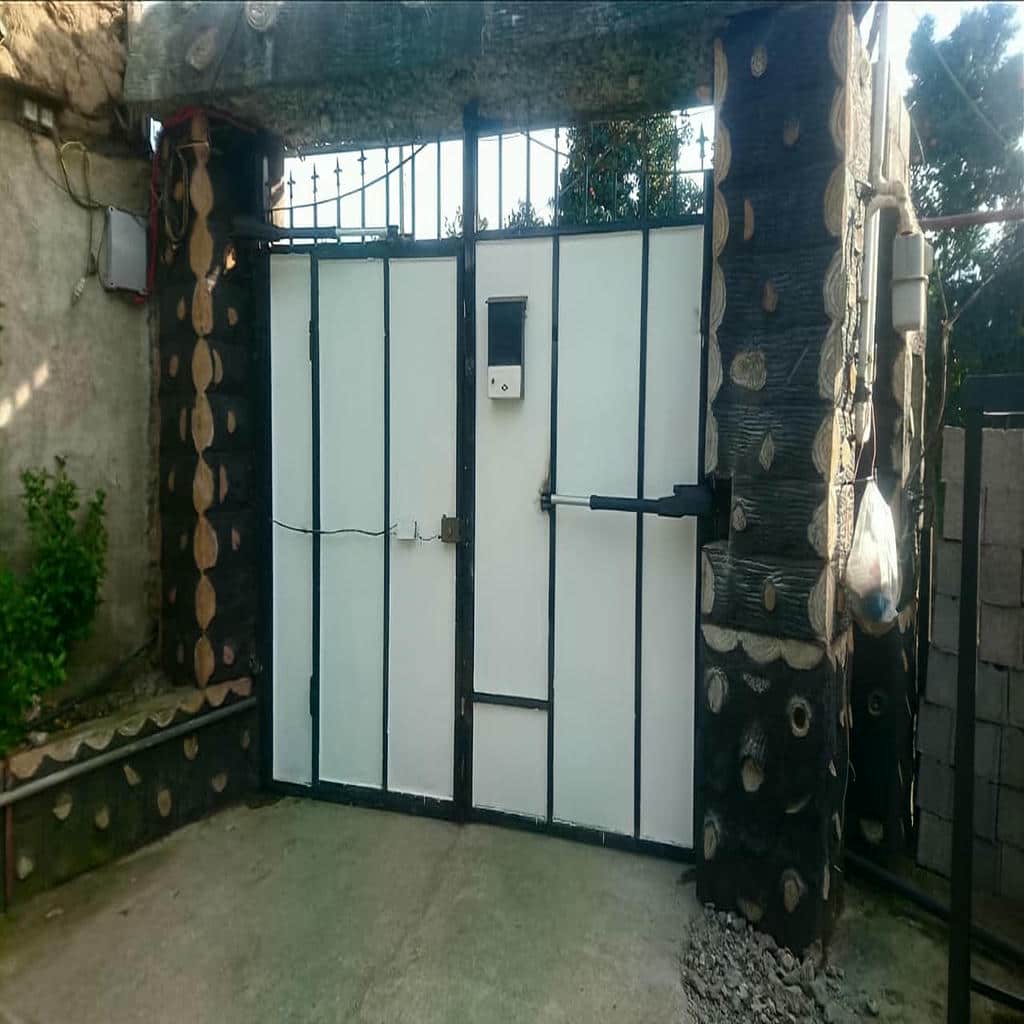 خدمات جک بازویی درب پارکینگ دو لنگه در کرمان