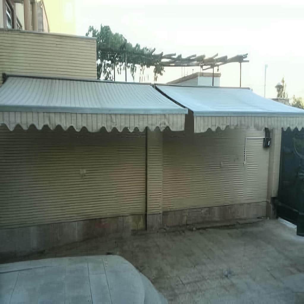 سایه بان اتوماتیک پارچه مقاوم