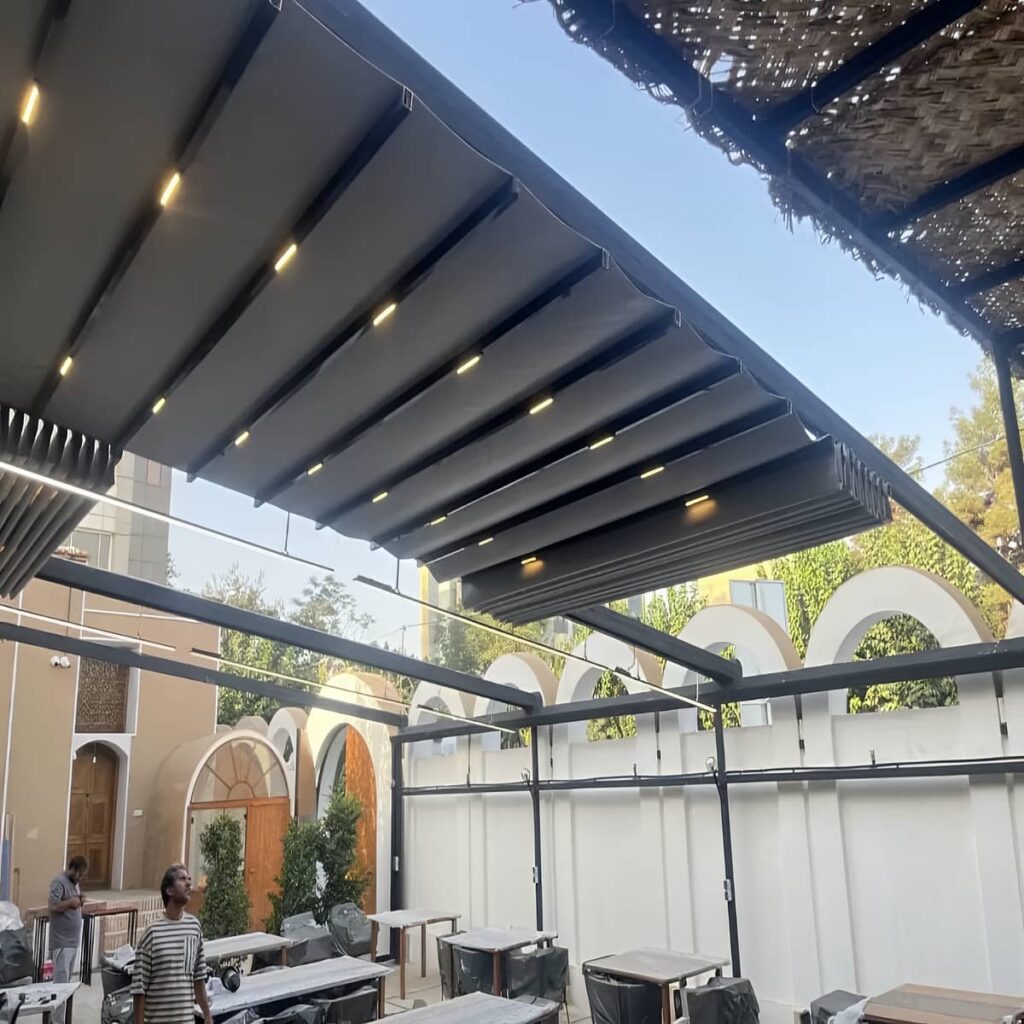 سایه بان برقی بالکن ساختمان در کرمان