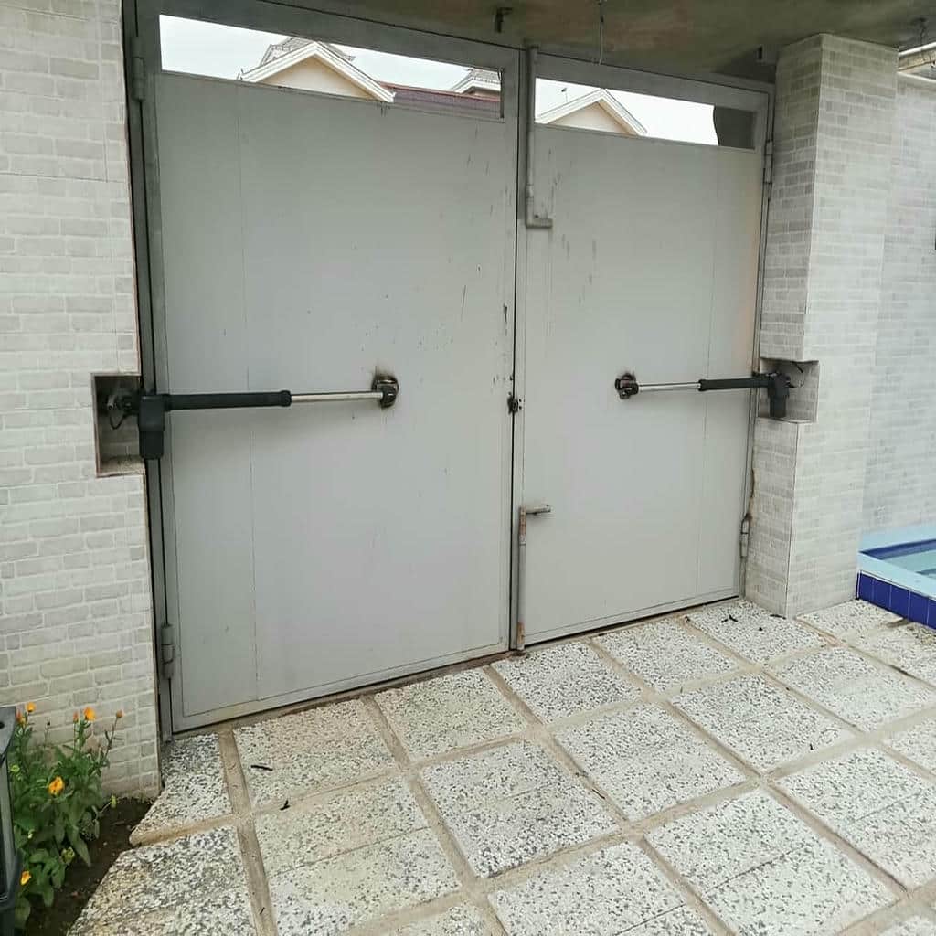 جک ریلی درب پارکینگ کرمان با ریل حرکتی فلزی